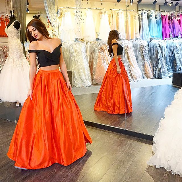 Orange and 2025 black prom dresses